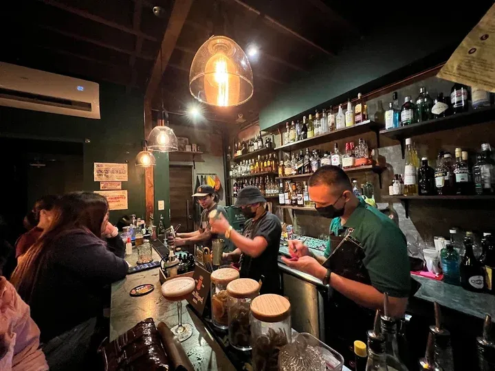INT. Bar / EXT. Cafe